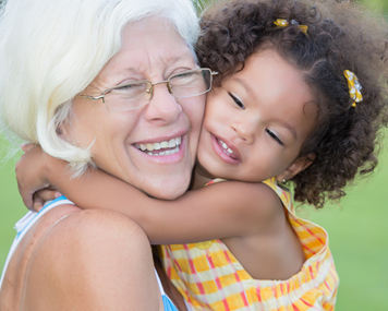 grandma getting hugs from toddler